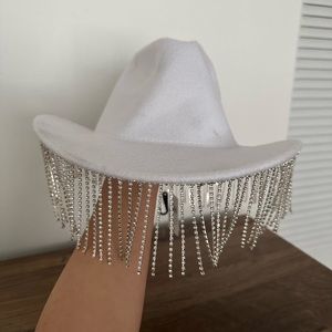 Brand new white cowboy hat with jeweled fringe detail.